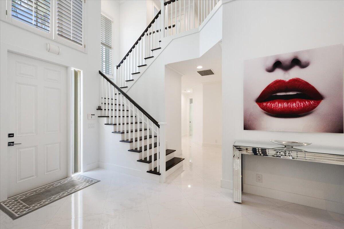 2514 Players Court Wellington, FL 33414 - Photo 19 of 30 a view of entryway and hall