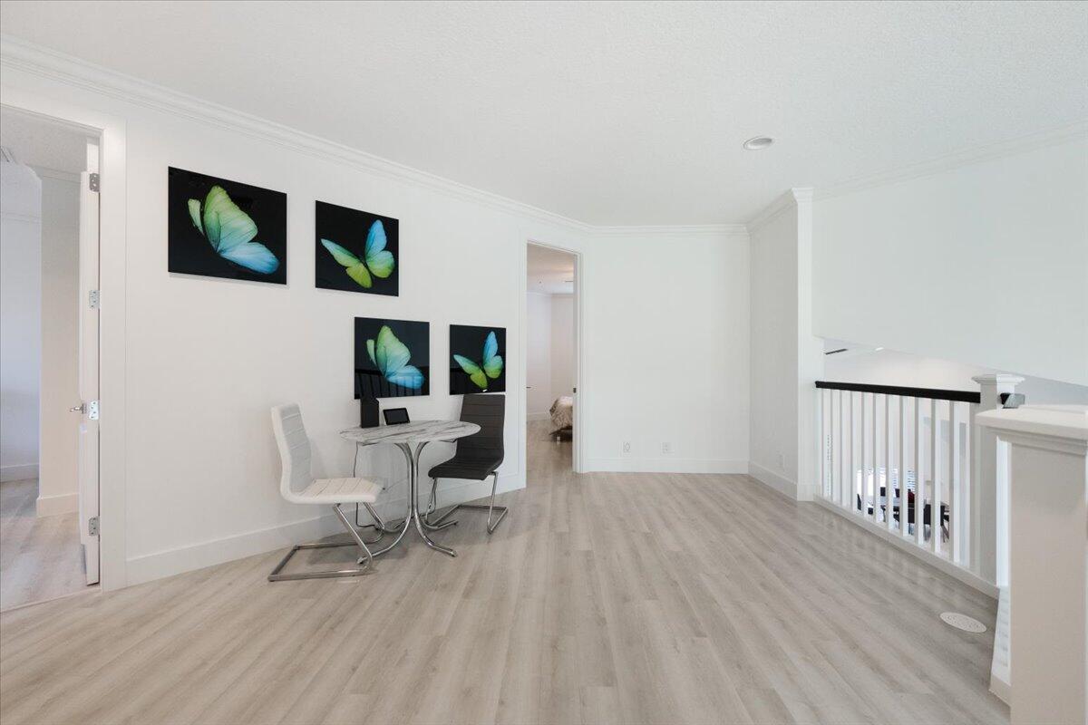 2514 Players Court Wellington, FL 33414 - Photo 20 of 30 a living room with furniture and a wooden floor