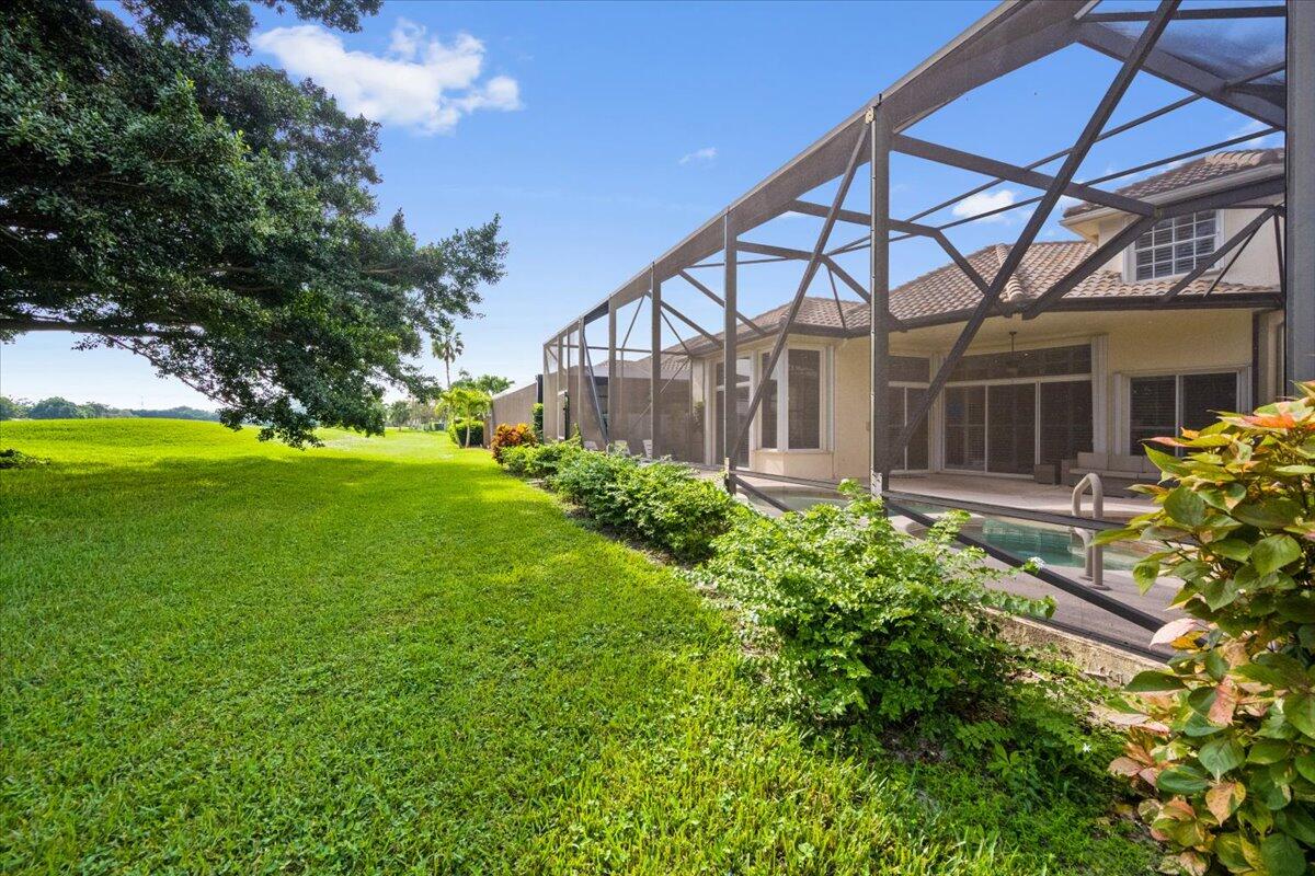 2514 Players Court Wellington, FL 33414 - Photo 29 of 30 a view of a house with garden
