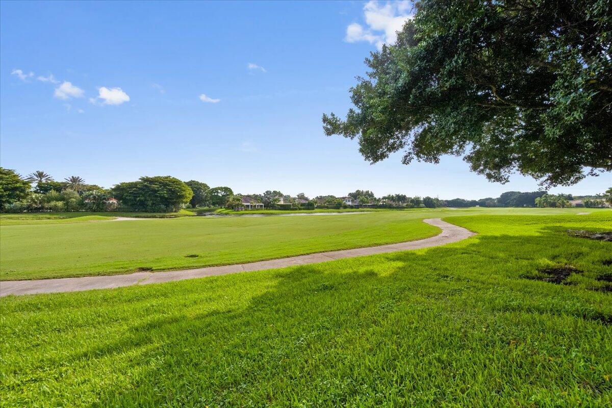 2514 Players Court Wellington, FL 33414 - Photo 30 of 30 a view of a lake with a big yard