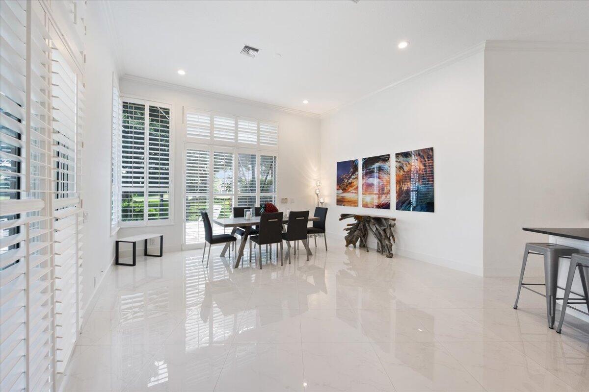 2514 Players Court Wellington, FL 33414 - Photo 7 of 30 a view of a livingroom with furniture and window