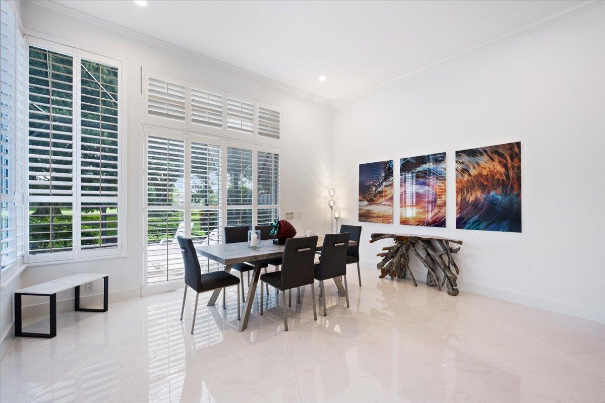 2514 Players Court Wellington, FL 33414 - Photo 8 of 30 a dining room with furniture and window