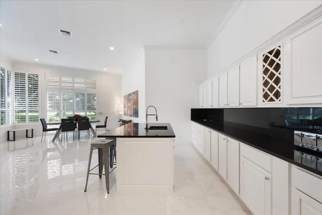 a kitchen with counter top space cabinets and outdoor view