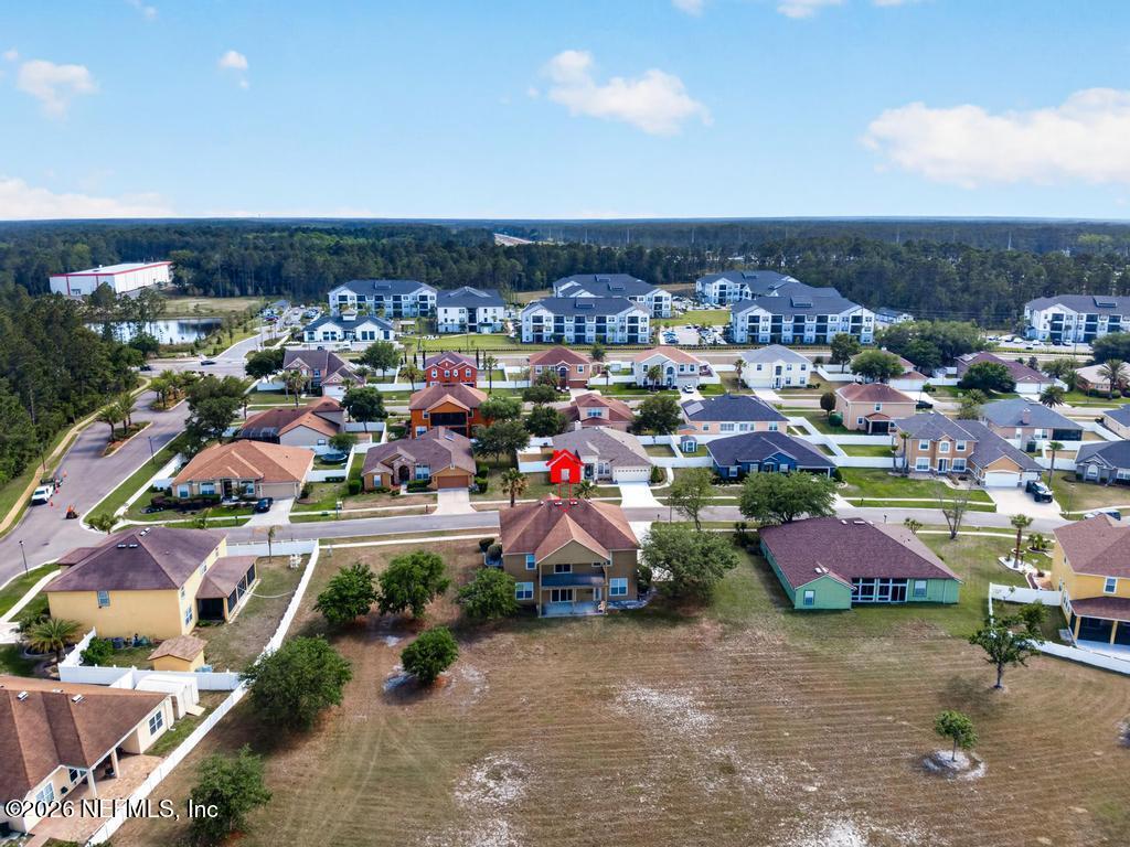 10917 Dancing Rabbit Lane Jacksonville, FL 32210 - Photo 103 of 121 Dancing Rabbit Ln Aerial Rear home marke