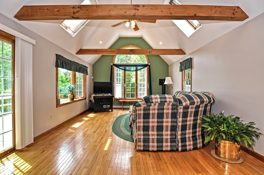15 Dana Road Sandwich, MA 02644 - Photo 8 of 30 a living room with a bed furniture and a large window