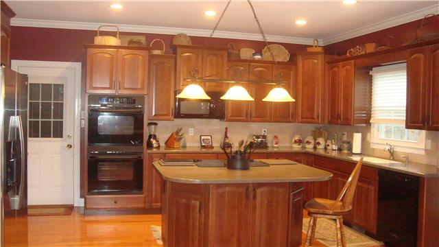 548 Pond Apple Road Clarksville, TN 37043 - Photo 4 of 20 The Kitchen has been Remodeled with New Cabinets, Granite Countertops, New Appliances & Flooring