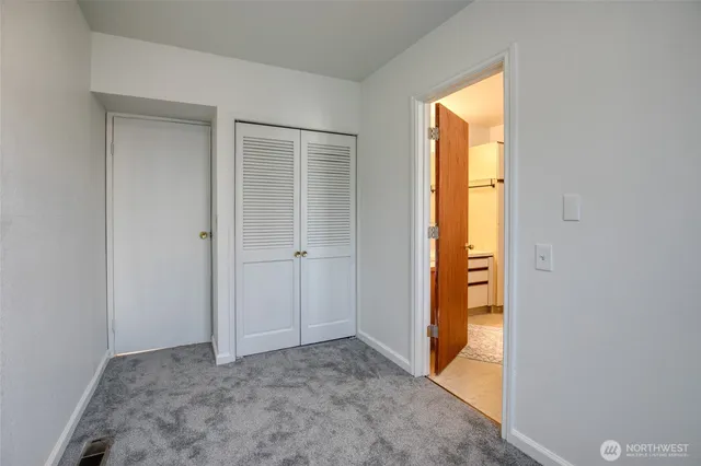 a view of entryway and hall with a hallway