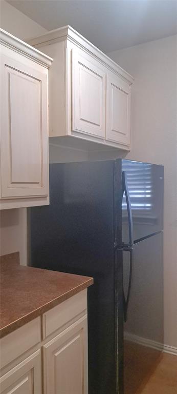 1301 Old Dicey Road, Unit 443 Weatherford, TX 76085 - Photo 8 of 11 a room with storage and utility