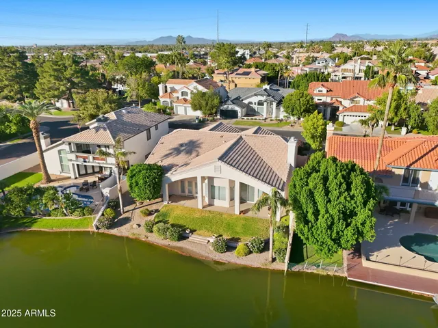 an aerial view of a house with a outdoor space