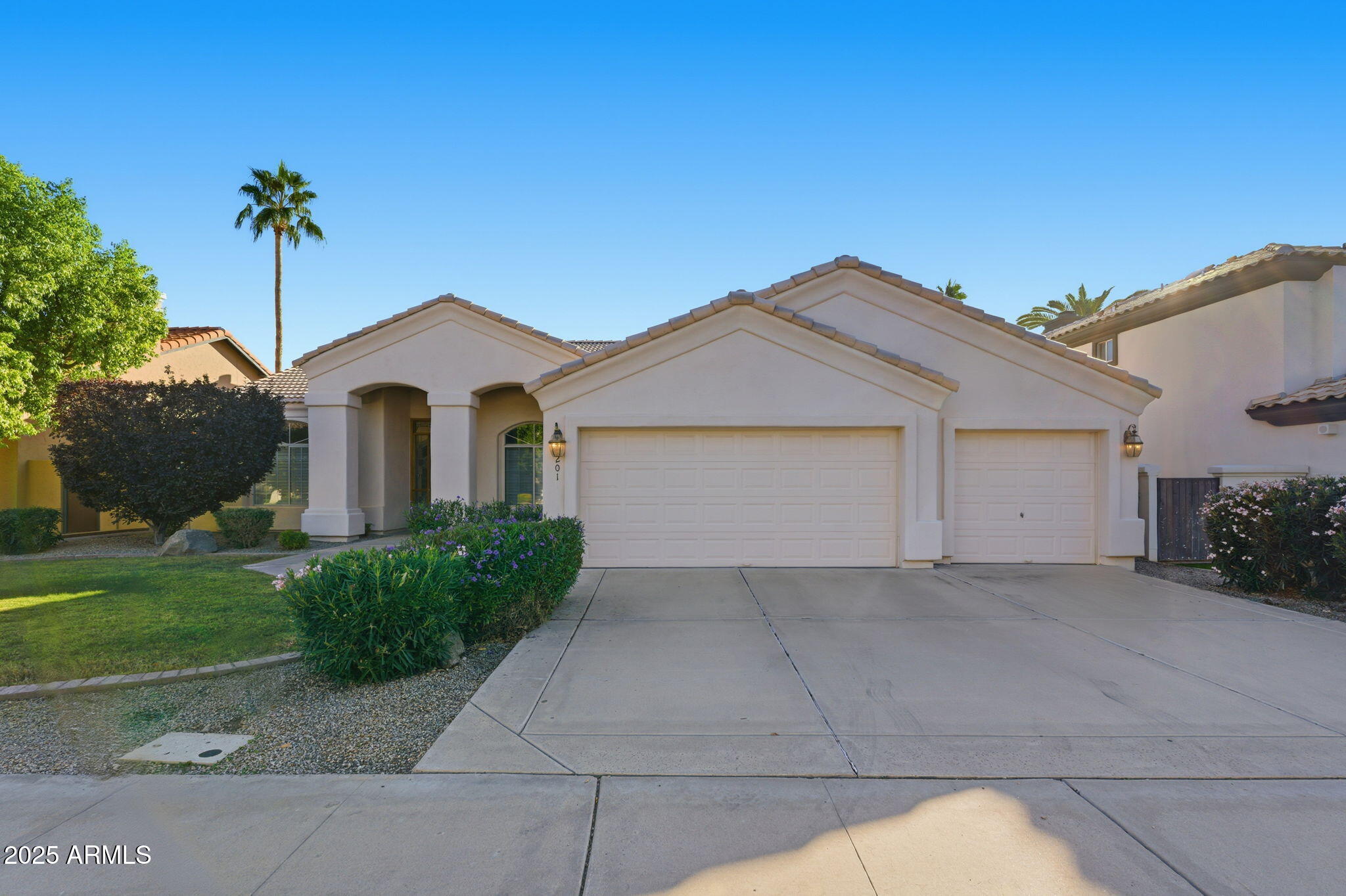 2011 East Clipper Lane Gilbert, AZ 85234 - Photo 17 of 51 a front view of a house with a yard and garage
