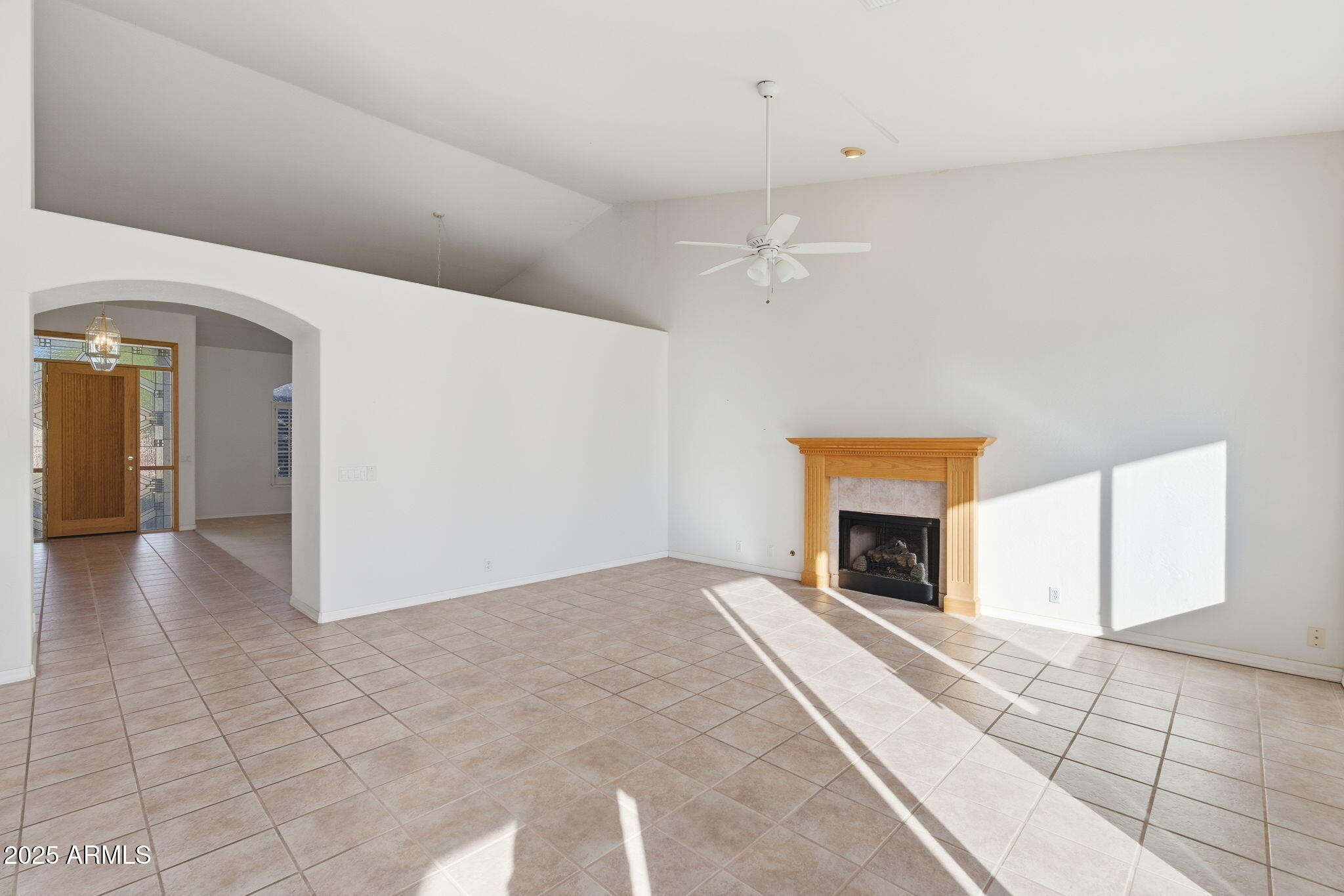 2011 East Clipper Lane Gilbert, AZ 85234 - Photo 22 of 51 a view of empty room with a fireplace and window