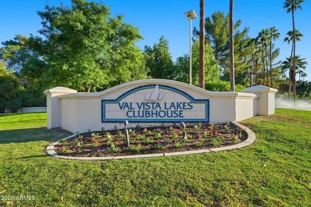 a view of a table and chairs in the garden