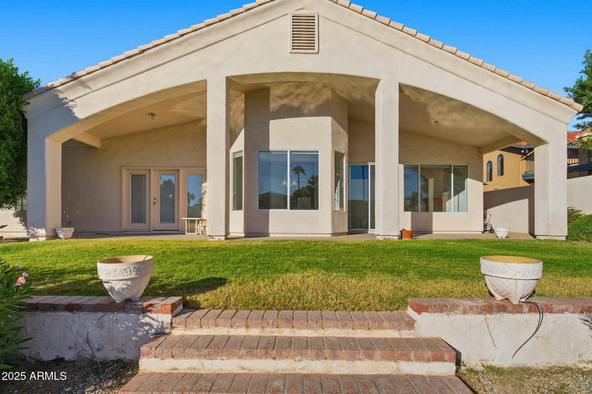 2011 East Clipper Lane Gilbert, AZ 85234 - Photo 6 of 51 a front view of a house with garden
