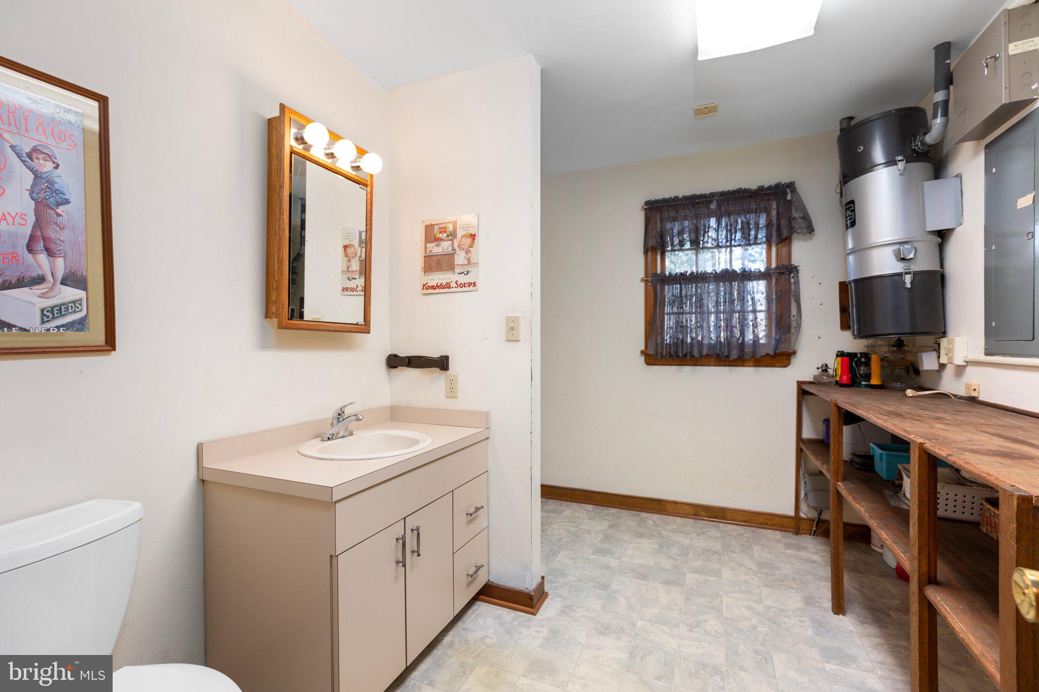 4525 Dickerson Road Partlow, VA 22534 - Photo 51 of 104 Half bath off mud room can enter from garage