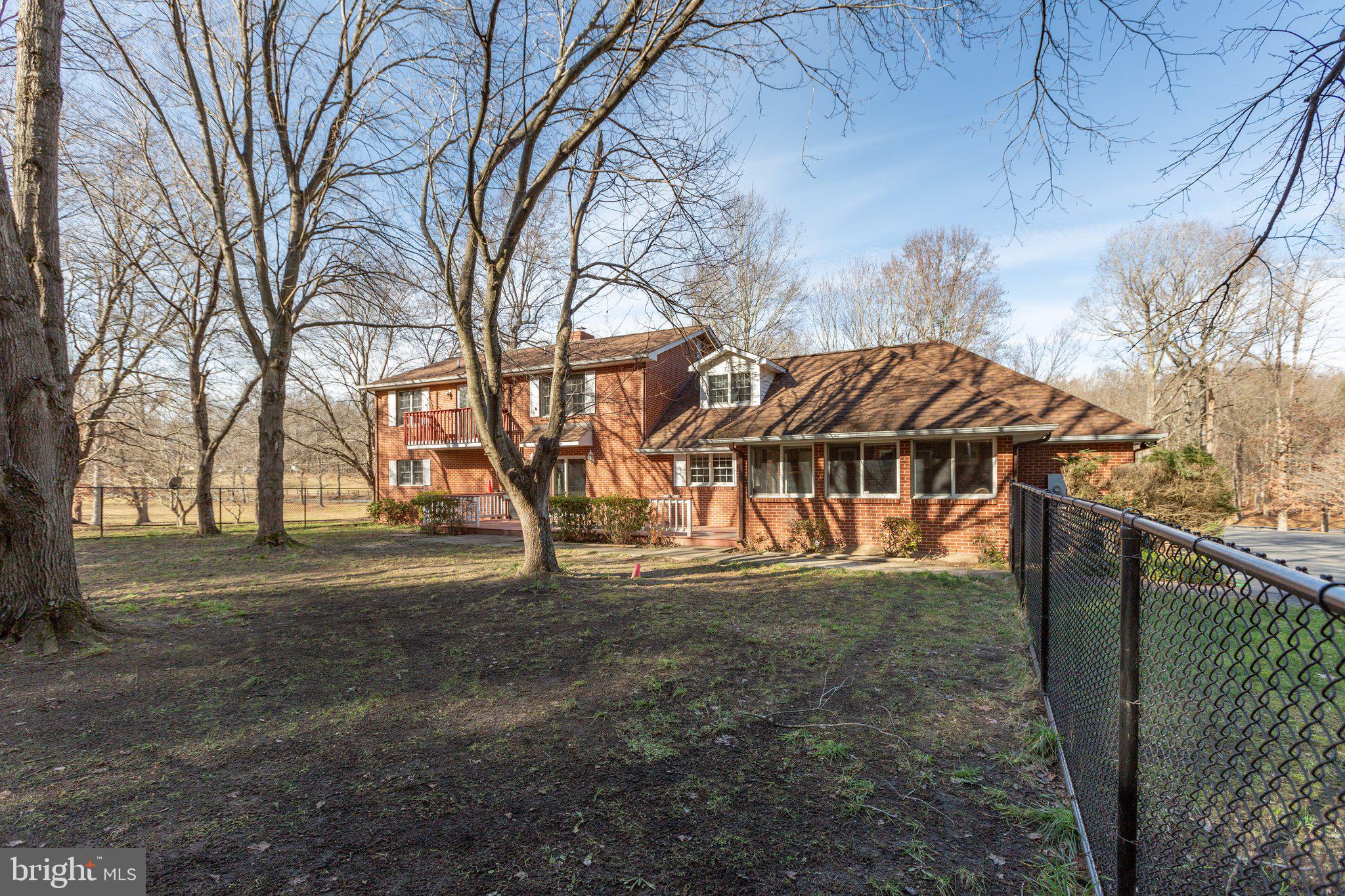 4525 Dickerson Road Partlow, VA 22534 - Photo 8 of 104 Back yard looking at back of house-fenced area.