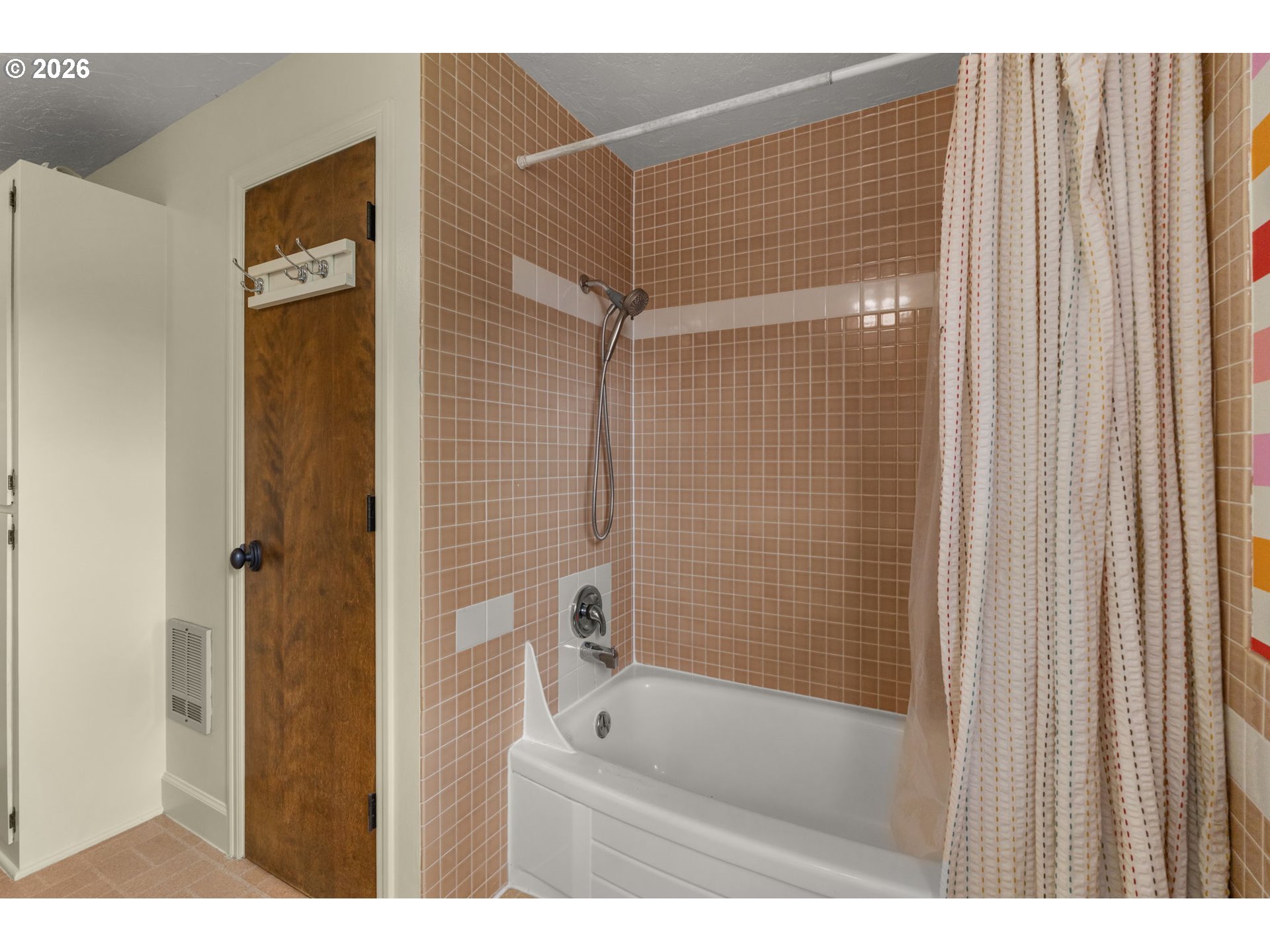 1995 Greiner Street Eugene, OR 97405 - Photo 33 of 39 a bathroom with a bathtub and a shower