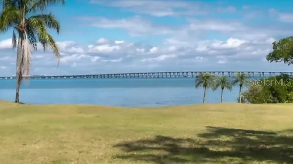 a view of a lake and a yard