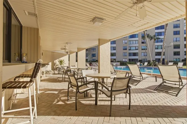 a building outdoor space with patio furniture