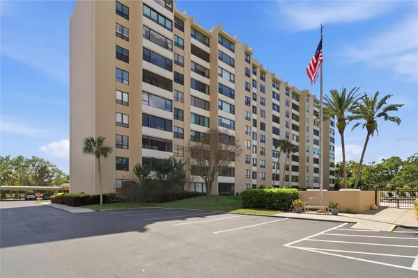 a view of a pathway with a city view