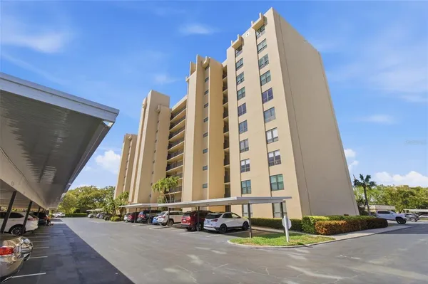 a view of a chairs and tables in the patio