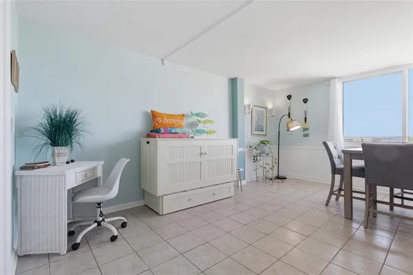 a view of a workspace with furniture