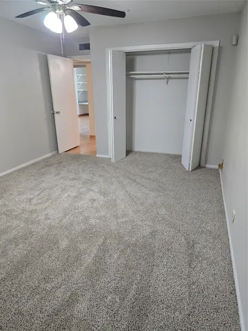 an empty room with a mirror