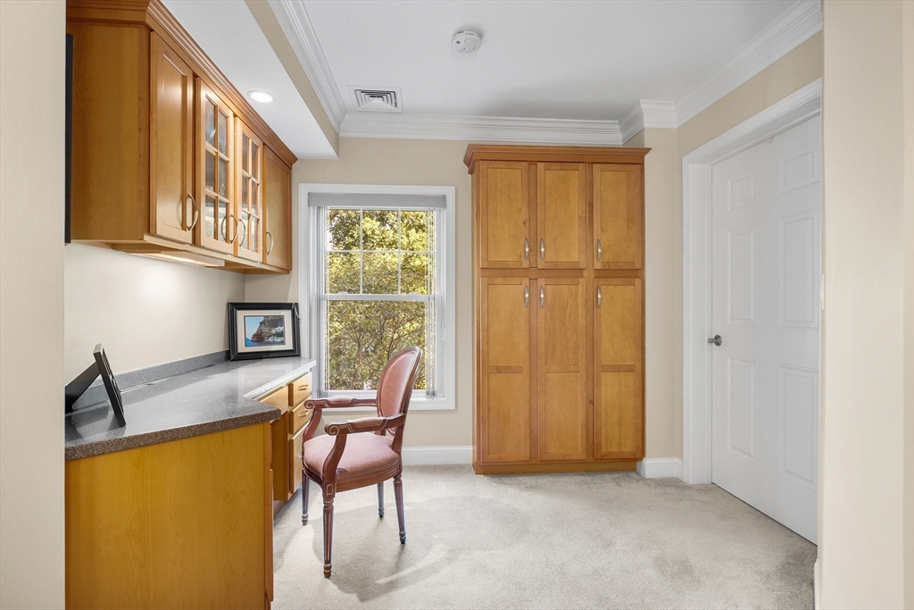 490 Main Street, Unit 215 Northborough, MA 01532 - Photo 15 of 37 a workspace with furniture and a window