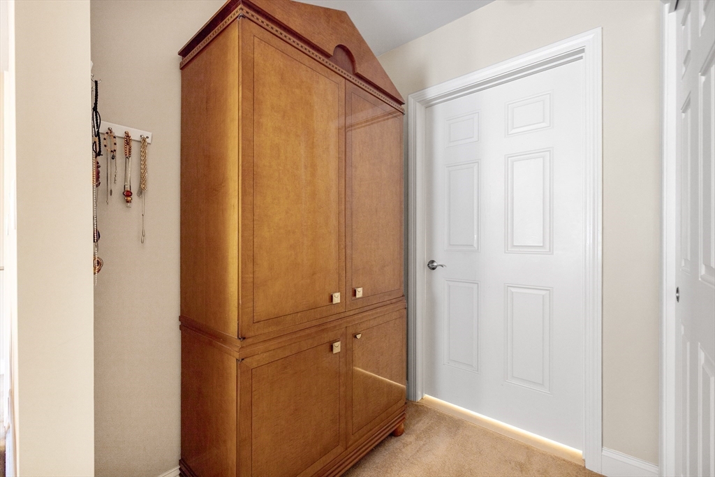 490 Main Street, Unit 215 Northborough, MA 01532 - Photo 22 of 37 a bathroom with a shower and a mirror