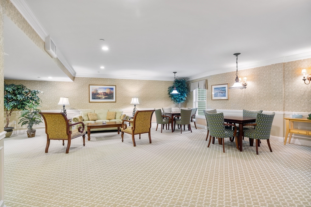 490 Main Street, Unit 215 Northborough, MA 01532 - Photo 32 of 37 a view of a dining room with furniture
