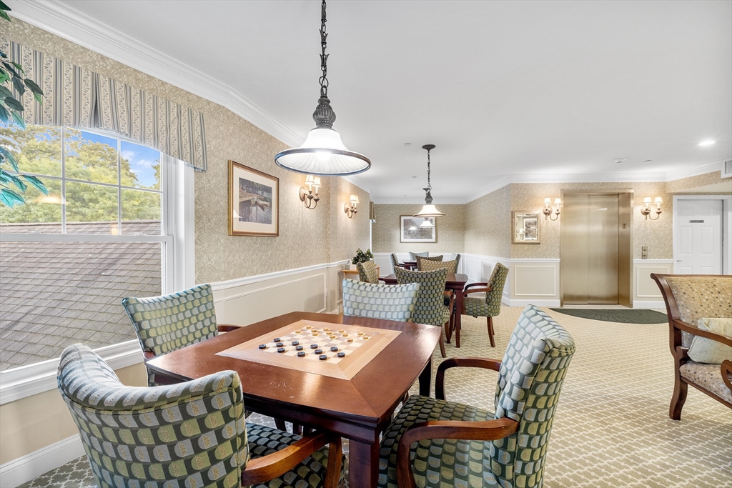 490 Main Street, Unit 215 Northborough, MA 01532 - Photo 33 of 37 a view of a dining room with furniture
