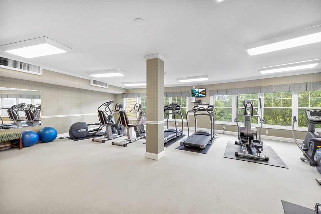 490 Main Street, Unit 215 Northborough, MA 01532 - Photo 34 of 37 a view of a room with gym equipment