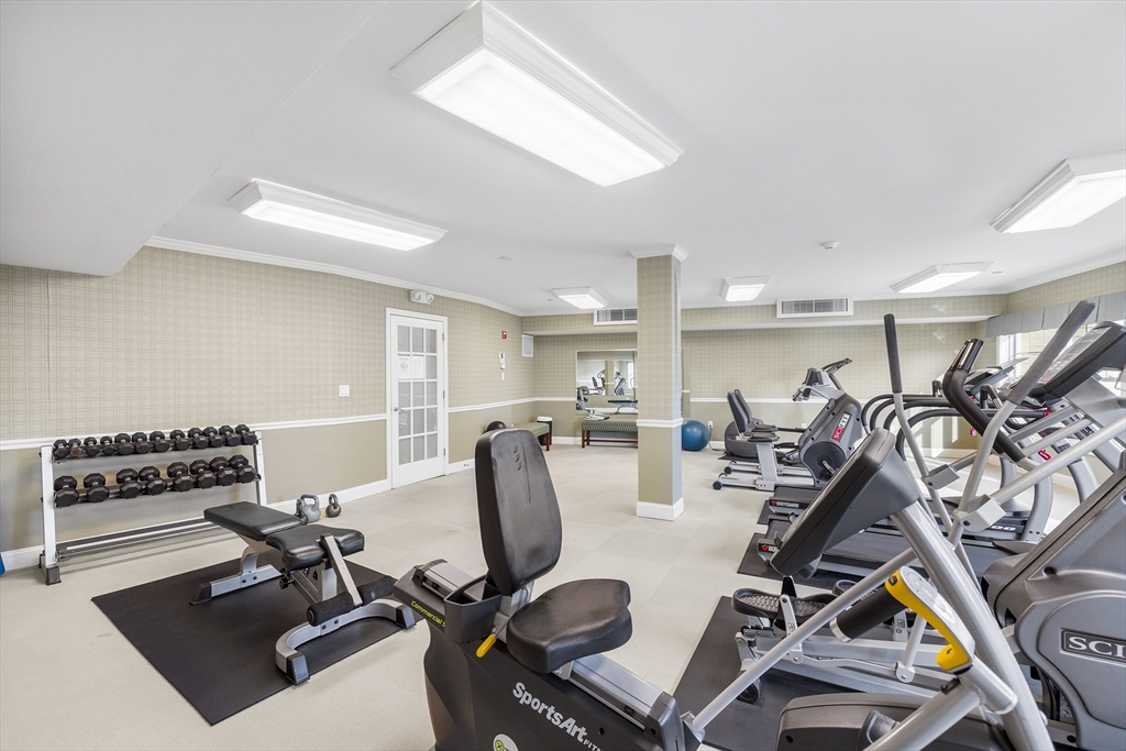 490 Main Street, Unit 215 Northborough, MA 01532 - Photo 35 of 37 a view of a room with gym equipment
