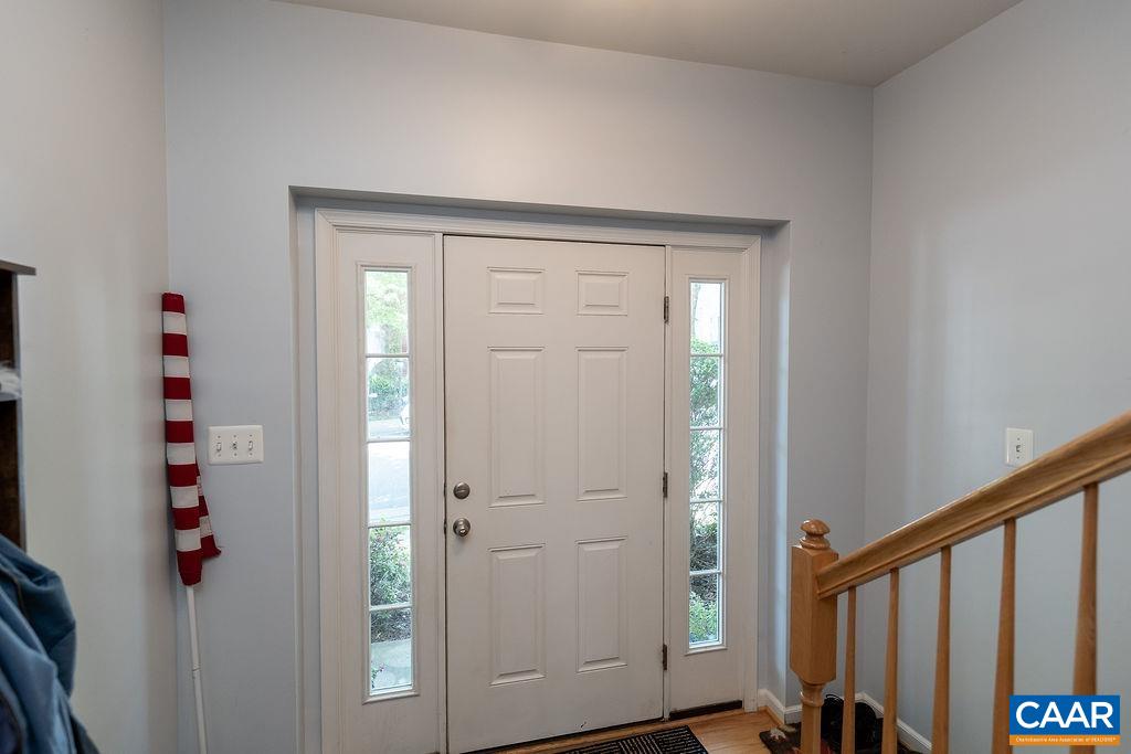 920 Bing Lane Charlottesville, VA 22903 - Photo 3 of 47 a view of a hallway with wooden floor and entryway