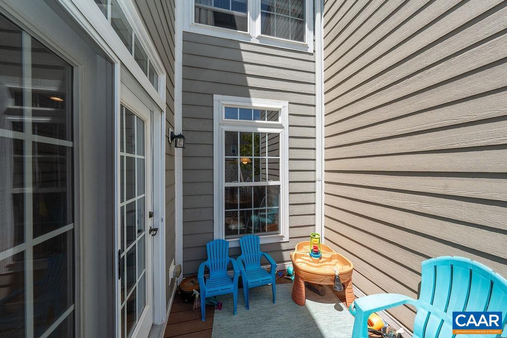 920 Bing Lane Charlottesville, VA 22903 - Photo 35 of 47 a view of a patio with couple of chairs and a door
