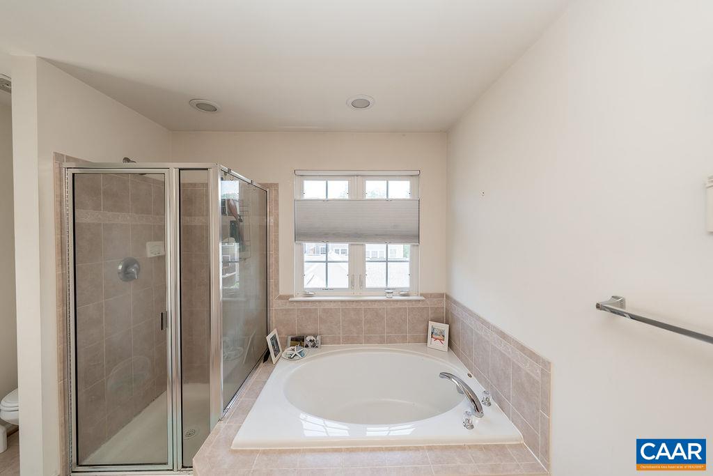 920 Bing Lane Charlottesville, VA 22903 - Photo 40 of 47 a bathroom with a tub shower and sink