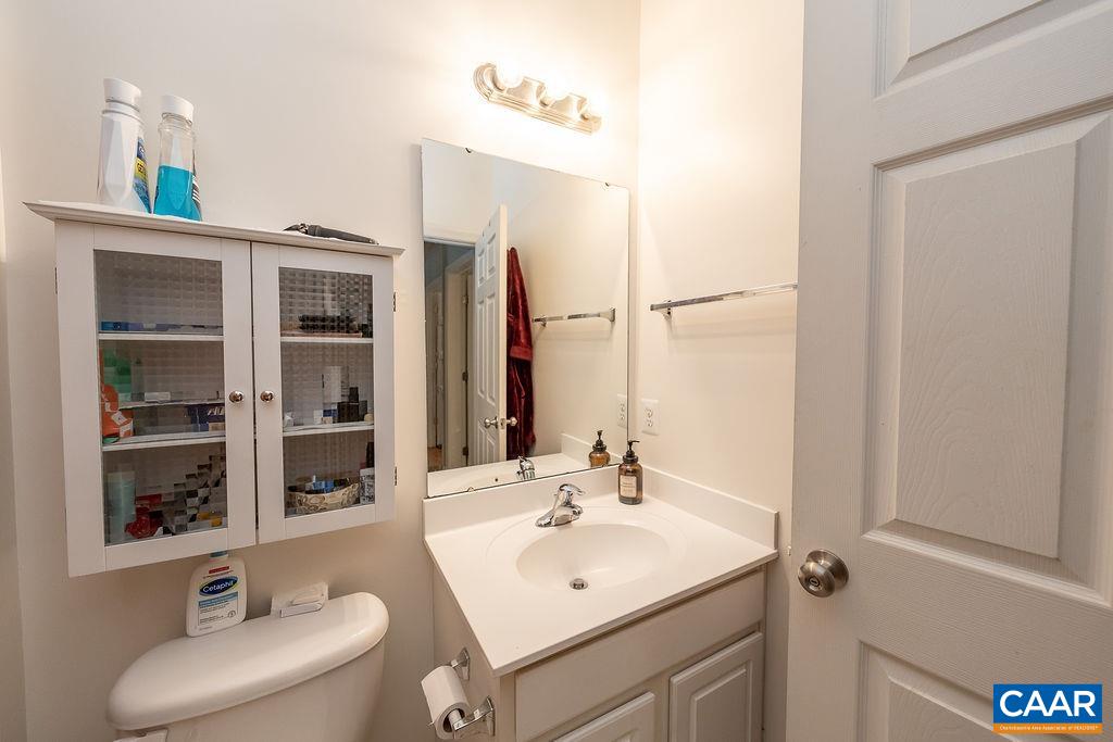 920 Bing Lane Charlottesville, VA 22903 - Photo 10 of 47 a bathroom with a sink a toilet and a mirror
