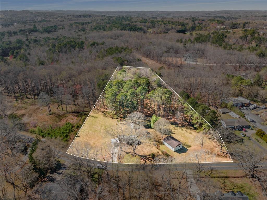 16770 Phillips Road Alpharetta, GA 30004 - Photo 1 of 1 an aerial view of a house with a yard