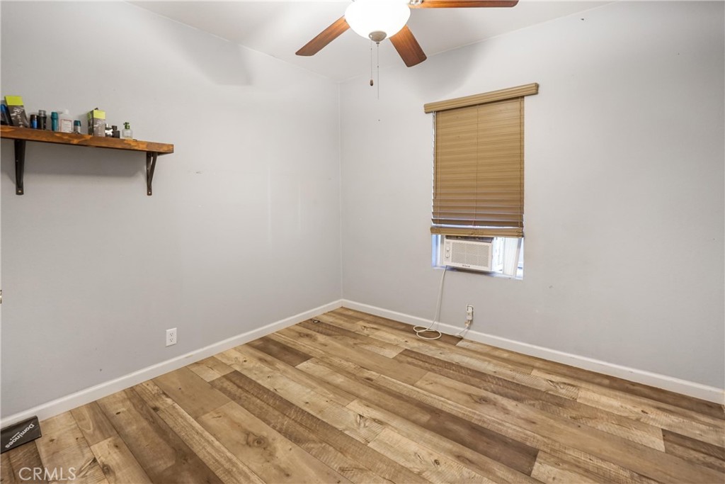 12700 Elliott El Monte, CA 91732 - Photo 14 of 18 a view of a room with rack and wooden floor