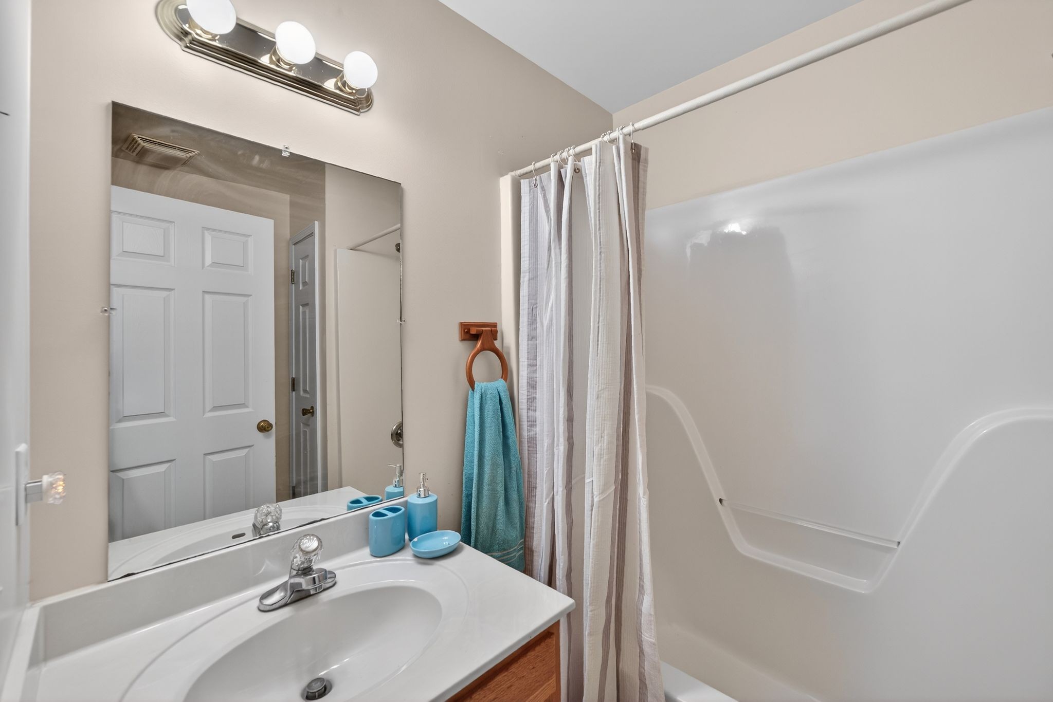 833 Blakemore Road Dickson, TN 37055 - Photo 11 of 47 a bathroom with a sink and a mirror