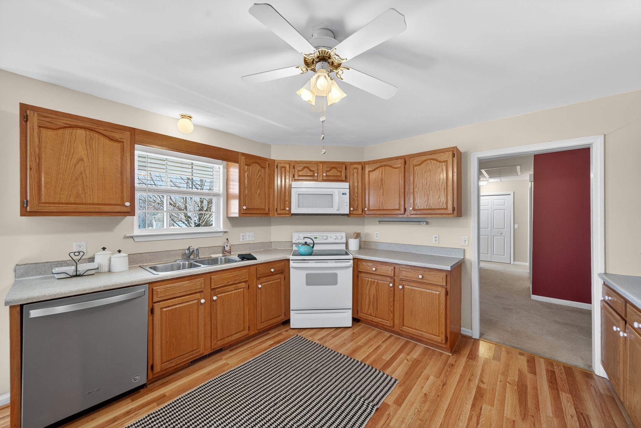 833 Blakemore Road Dickson, TN 37055 - Photo 20 of 47 a kitchen with a sink stove and cabinets