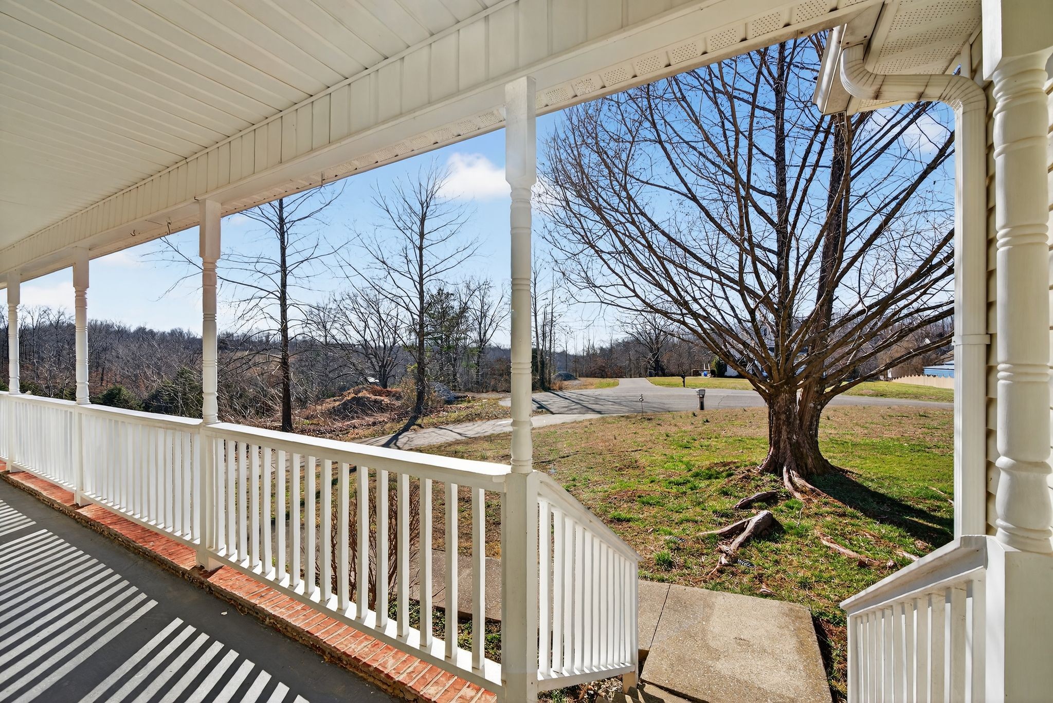 833 Blakemore Road Dickson, TN 37055 - Photo 44 of 47 a view of a wooden house with a yard and furniture