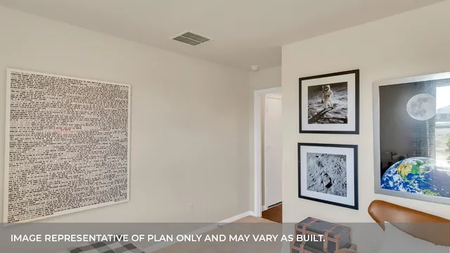a view of a hallway with painting on wall and a painting on the wall