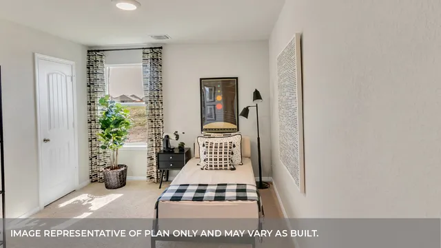 a view of a hallway with wooden floor and furniture