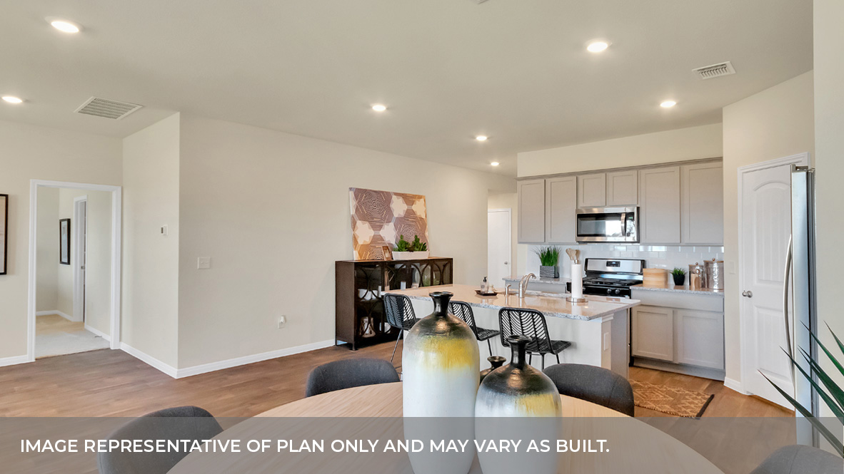 9504 Oxbow Strap Drive Austin, TX 78724 - Photo 20 of 30 a living room with stainless steel appliances kitchen island granite countertop furniture and a view of kitchen