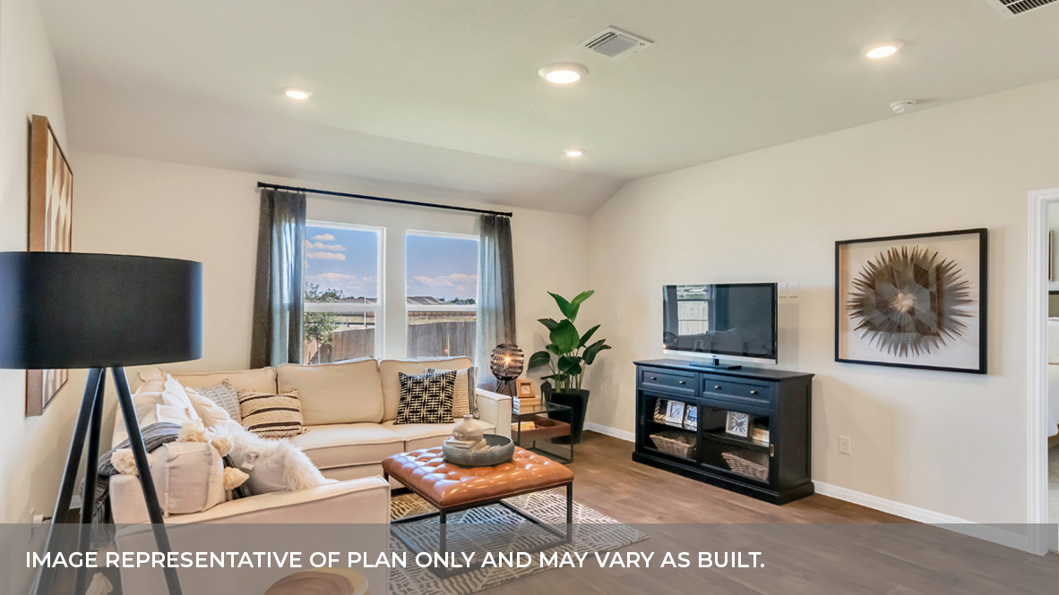 9504 Oxbow Strap Drive Austin, TX 78724 - Photo 21 of 30 a living room with furniture a flat screen tv and a fireplace