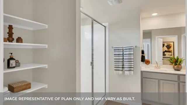 a bathroom with a sink a vanity and a mirror