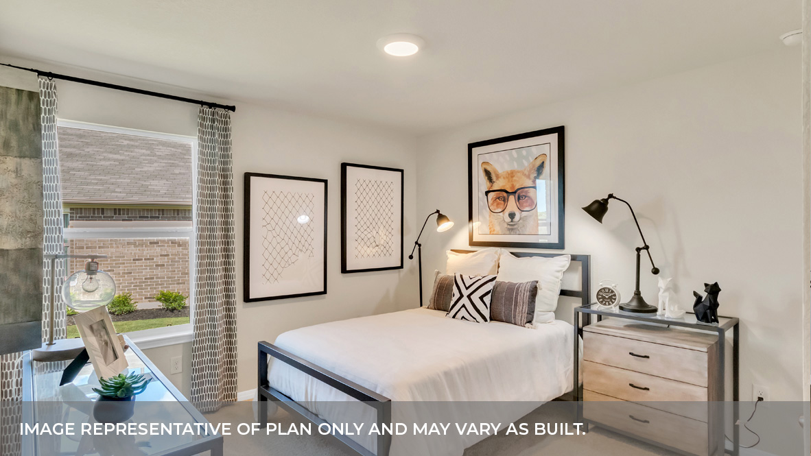 9504 Oxbow Strap Drive Austin, TX 78724 - Photo 8 of 30 a bedroom with a bed and a dresser