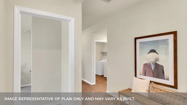 a view of a hallway with wooden floor and dining room view