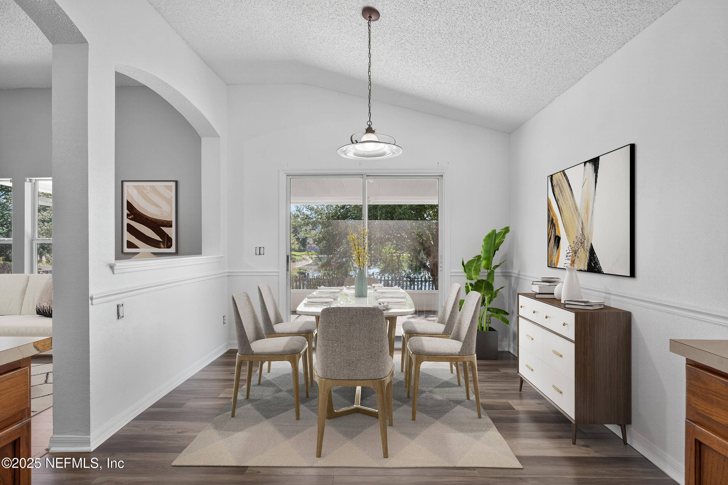 10174 Rising Mist Lane Jacksonville, FL 32221 - Photo 14 of 31 a view of a dining room with furniture window and wooden floor