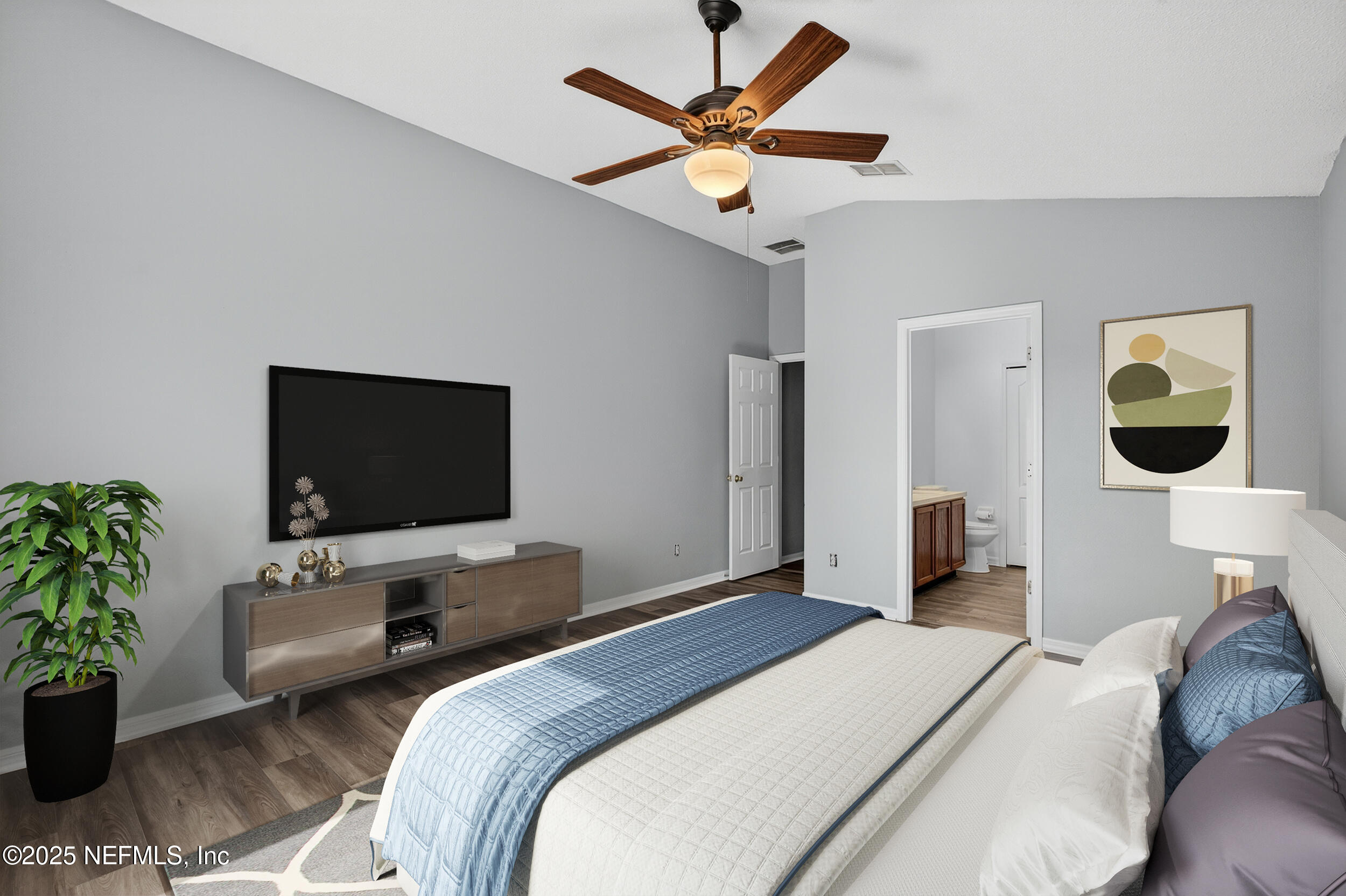 10174 Rising Mist Lane Jacksonville, FL 32221 - Photo 18 of 31 a bedroom with a bed window and a flat screen tv